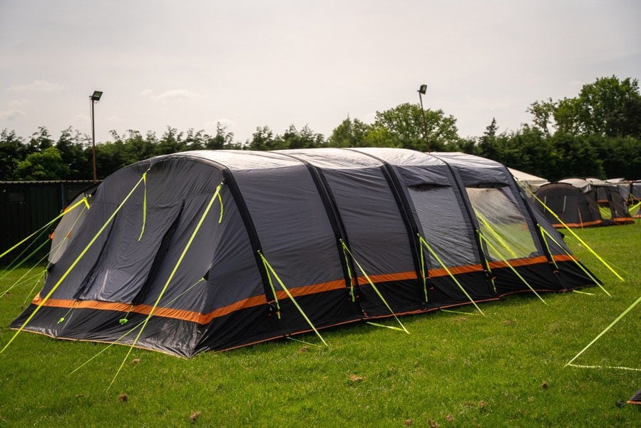 The Discovery 6 Berth Inflatable Tent shot from the outside with the door on