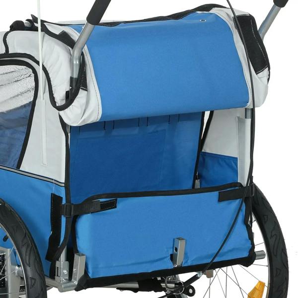 Blue two-seat bike trailer close-up of side window and safety harness straps