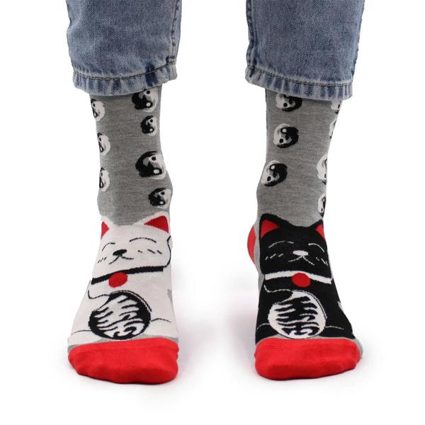 Gray bamboo socks with panda-cat faces, red heels and toe caps