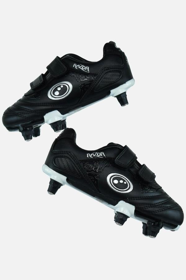 Black and white junior Optimum Razor football boots with twin touch-fasten straps and screw-in studs, pair - Optimum