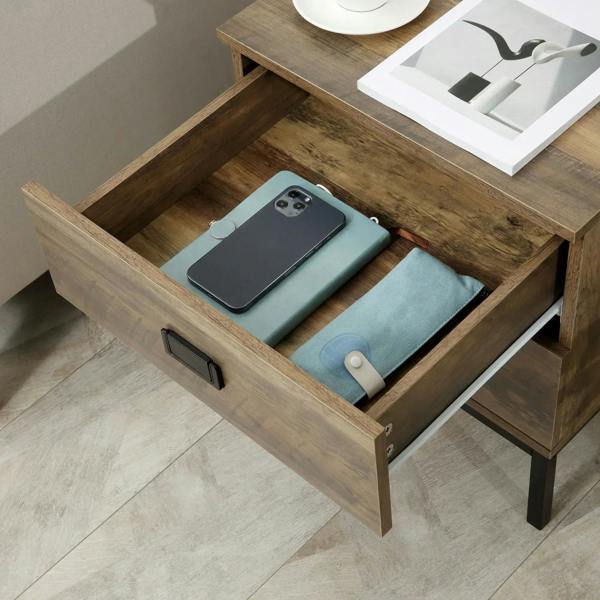 Brown retro bedside table with drawer open, showing phone and folded fabric inside