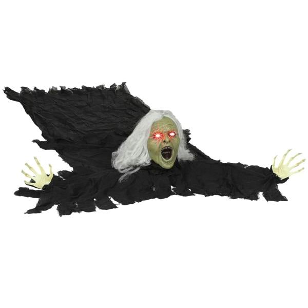 Life-size black crawling zombie decoration with glowing red eyes and open mouth, arms outstretched