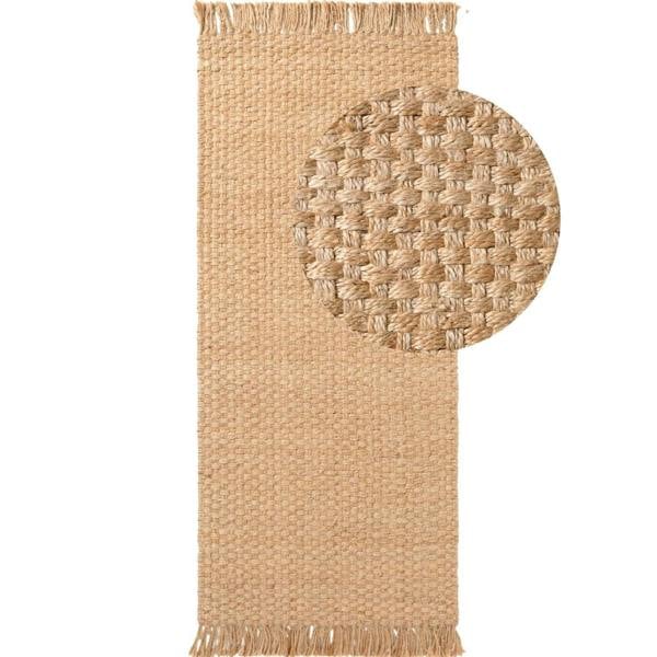 Beige woven mat with fringe on a white background