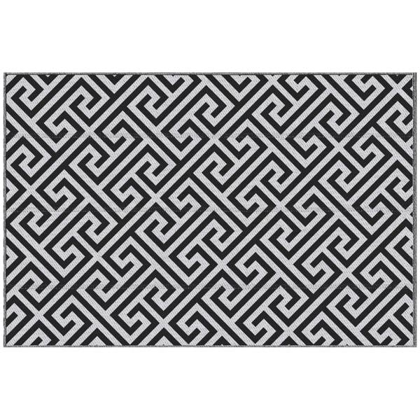 Black-and-white reversible outdoor rug with Greek key geometric pattern, flat woven mat.