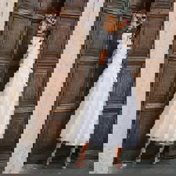 Flower girl wearing the Harper Dress