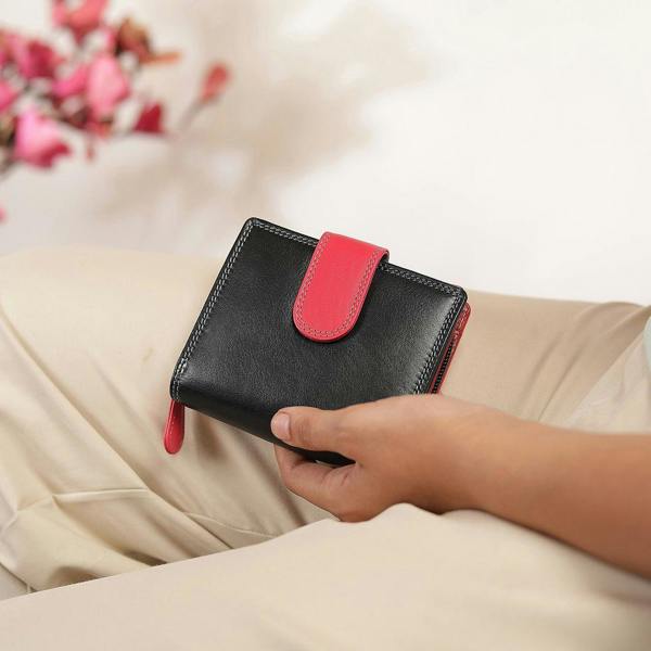 Person holding black Soft Leather Colourful Purse Camellia London