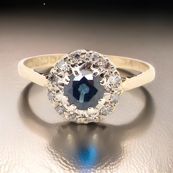 Vintage Tom A traditional 1980s Sapphire and Diamond Ring