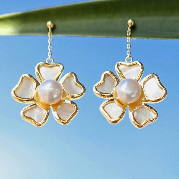 Floral drop earrings in gold vermeil with freshwater pearls and mother-of-pearl petals.