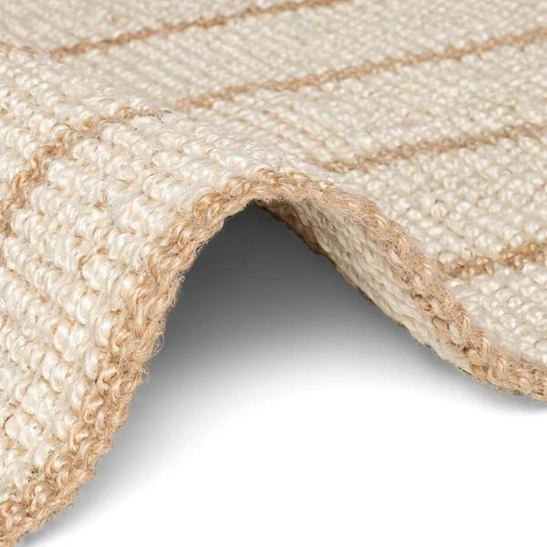 Textured beige rug with vertical stripes on a white background