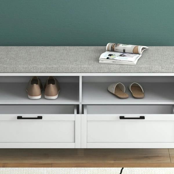 White shoe storage bench interior view with open compartments and two drawer fronts