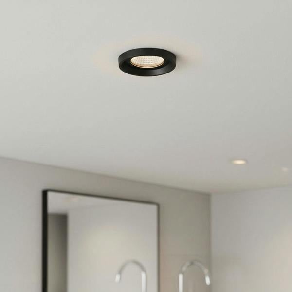 black bathroom ceiling spotlight recessed into a modern bathroom ceiling 