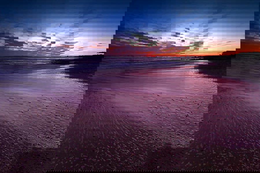 sunset over poole bay in Dorset