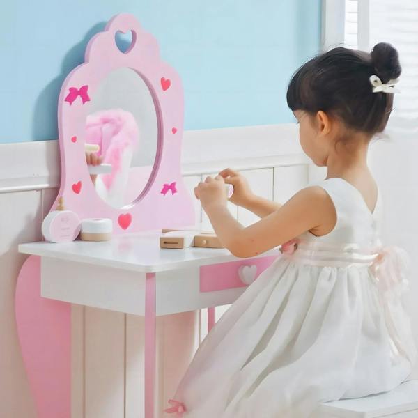 Kids pink dressing table with heart mirror and tabletop accessories