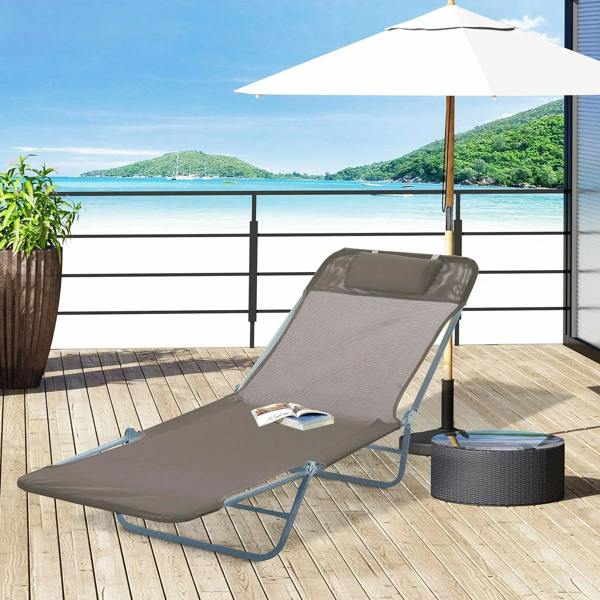 Brown foldable sun lounger with padded headrest under an outdoor umbrella