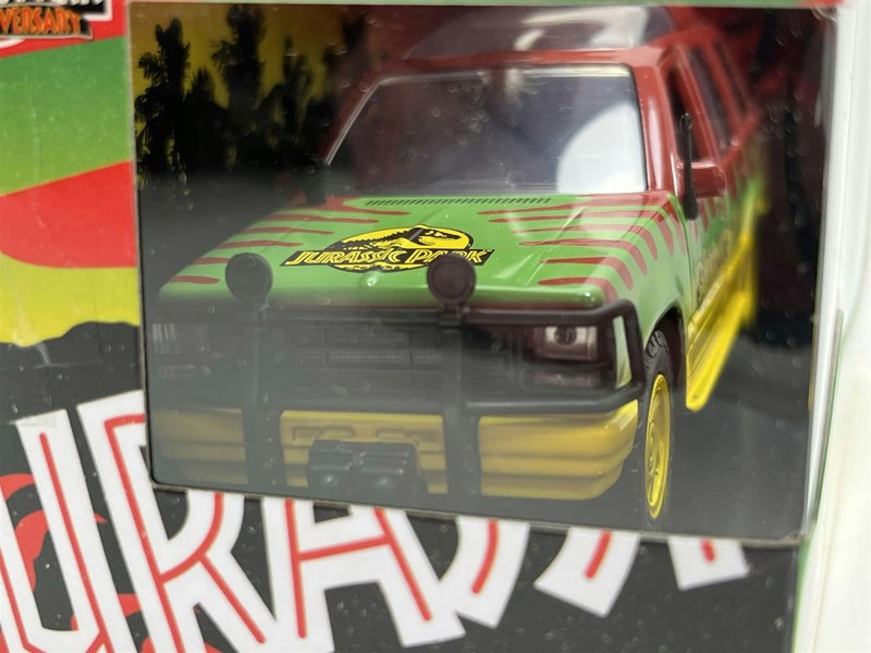 a toy car in a box