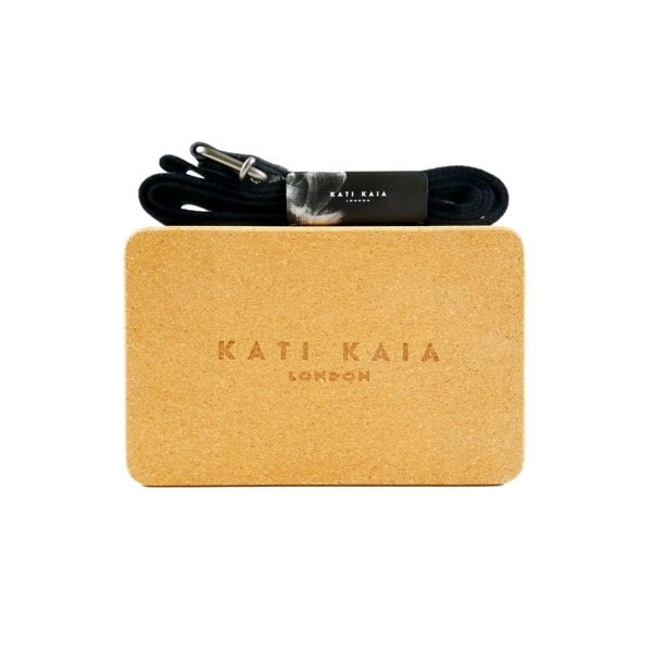 Kati Kaia Cork Block and Strap in natural cork colour, perfect for enhancing yoga and Pilates practices