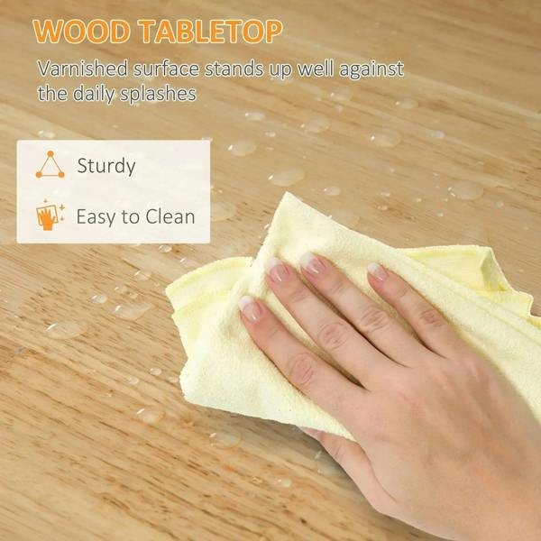 Wood tabletop on a white cart, shown being wiped for easy cleaning.