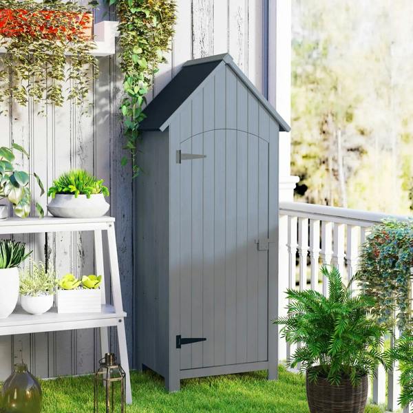 Grey wooden garden storage shed with tilt roof and lockable door, exterior side view