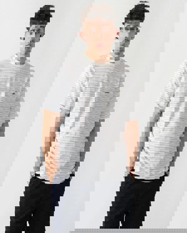 studio shot of a model wearing Lacoste Stripe Mens Classic Fit T-Shirt in Phoenix Blue-Flour