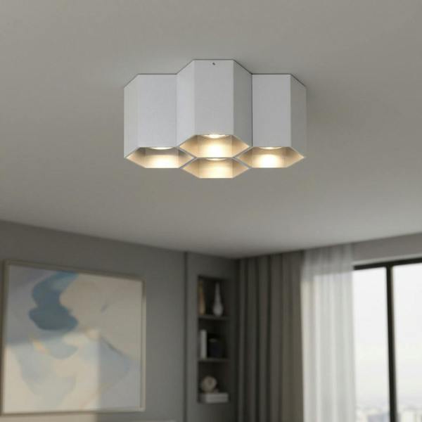silver modern flush mount ceiling light install in the living room of a modern home 
