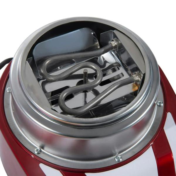 Stainless steel heating head inside clear dome of red cotton candy machine, close-up