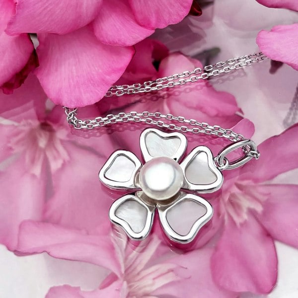 Floral pearl necklace by LENAE crafted from sterling silver.