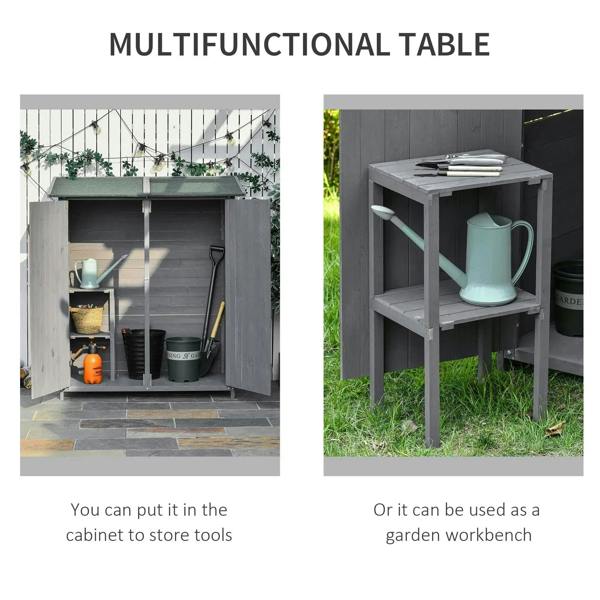 Grey wooden garden shed with green asphalt roof used as outdoor workbench