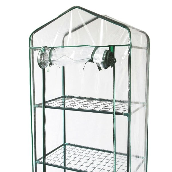Mini greenhouse with four tiers, clear plastic cover, metal frame, and open top for ventilation, ideal for indoor gardening
