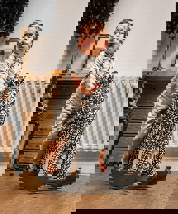 Little boy riding newborn rocking horse dazzle & jet