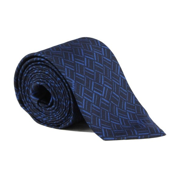Dunhill silk tie featuring an abstract longtail print inspired by the exaggerated typography of the iconic dunhill logo navy blue