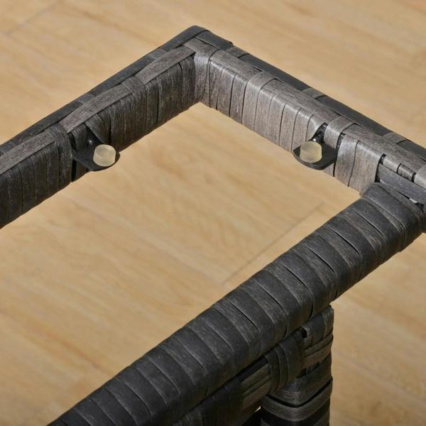 Grey rattan wicker corner joint and leg detail for outdoor furniture frame
