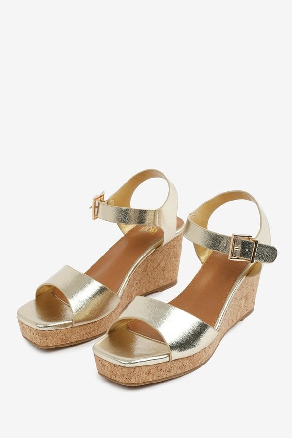 Where's That From Giselle  Wedge Sandals With Buckle Ankle Strap in Gold Grain Pu