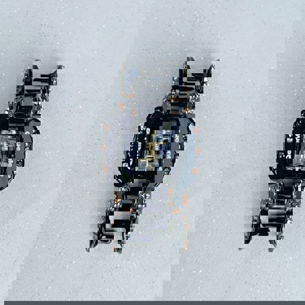 Black crystal hair claw clip, black jaw clasp, gold metal base, sparkling crystal embellishments, strong grip design, elegant decorative hair accessory
