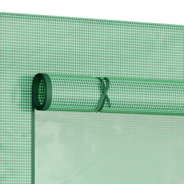 Rolled green PE greenhouse cover tube with attachment ropes on steel frame