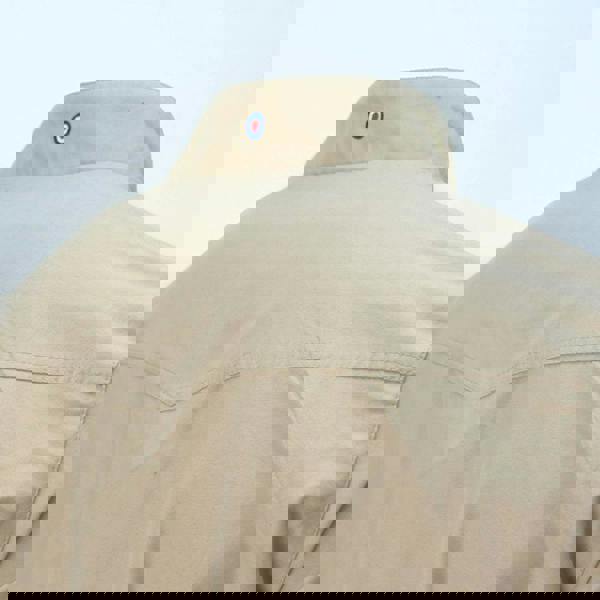 Lambretta Mens ShowerProof Classic Harrington MOD Scooter Jacket Coat, close-up of beige waterproof jacket with a collar and a small round MOD logo pin on the back of the collar.