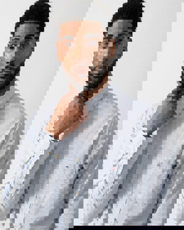 Model wearing GANT Mens Regular Fit Classic Poplin Gingham Shirt in 455 Light Blue - detail