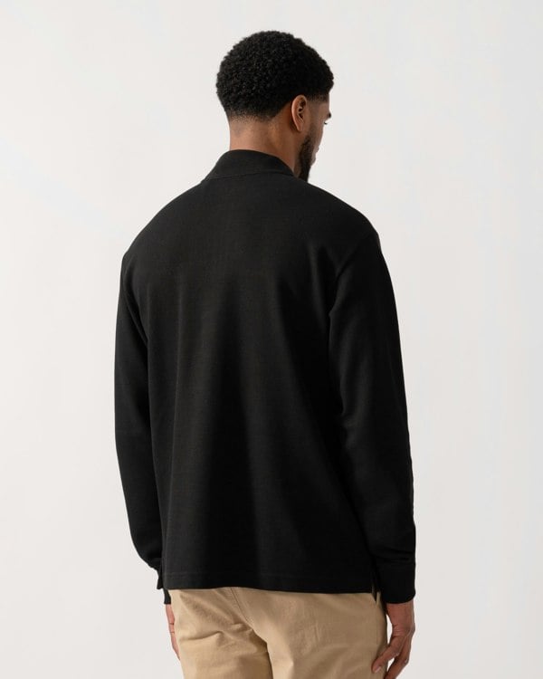 Model wearing BOSS Orange Hive Mens 1/4 Zip Sweatshirt in Black 001 - back