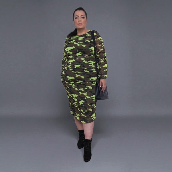Women's Plus Size Neon Lime Brown Black Camouflage Bodycon Midi Dress styled with black heels for a bold and chic look.