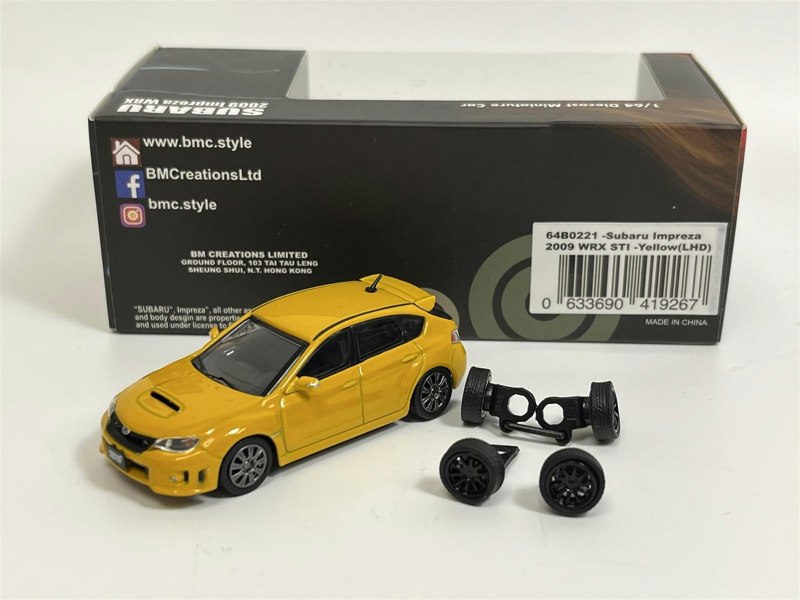 a yellow toy car with wheels