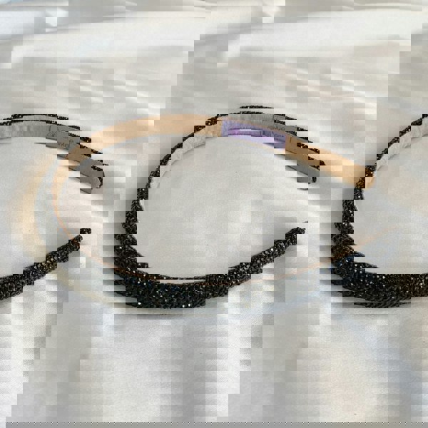 Black hair band, slim design, sparkly crystal embellishments, glitter finish, lightweight style, elegant decorative headband
