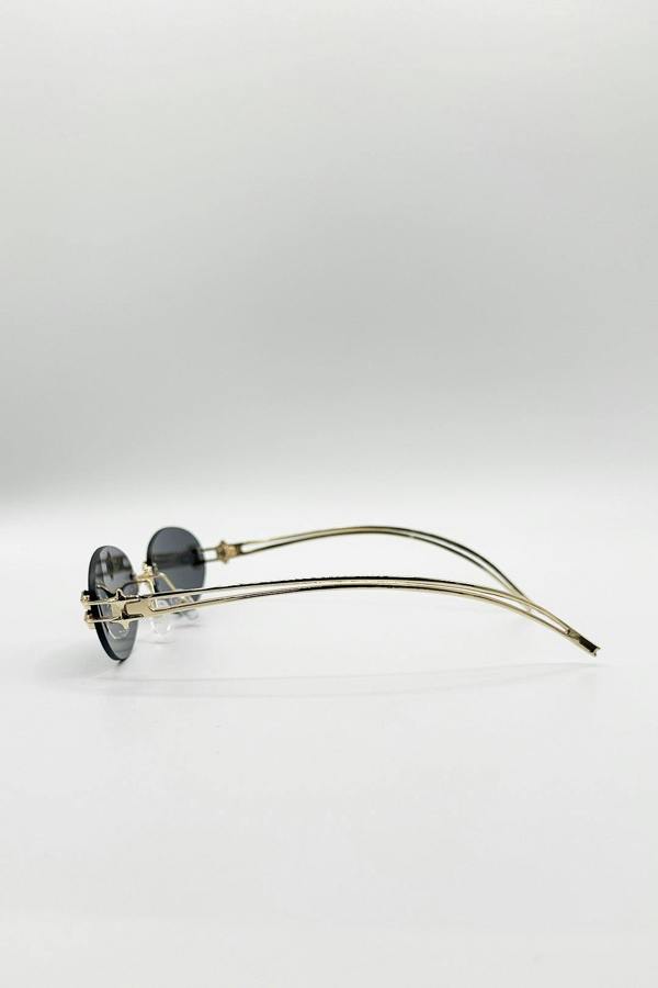 Rimless Oval Sunglasses In Black - svnx