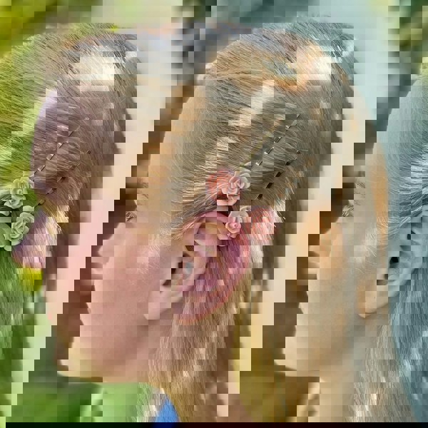 Pink slides rose hair clips hair down