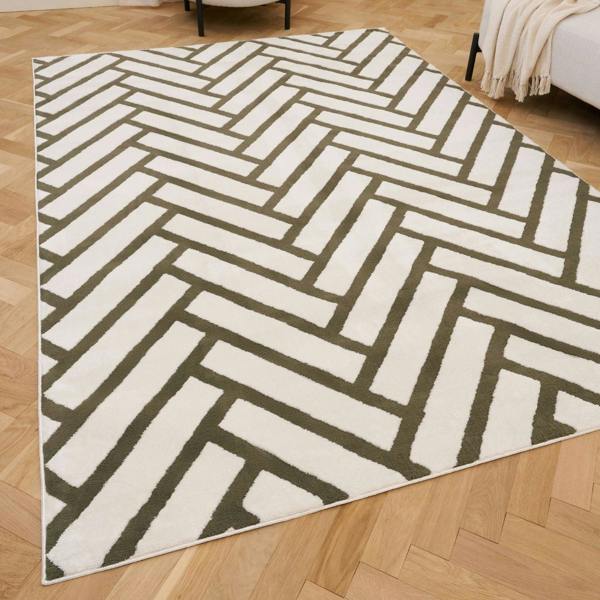 Geometric patterned rug on a wooden floor