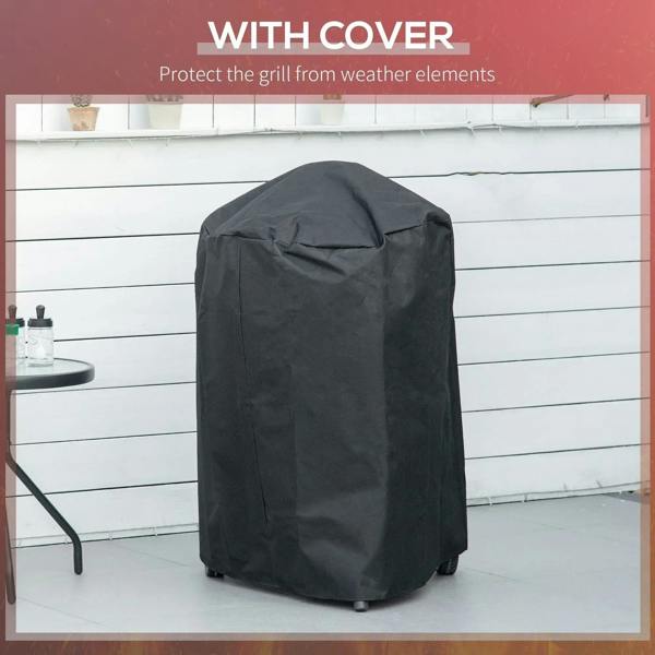 Black portable kettle charcoal grill with protective cover over the lid.