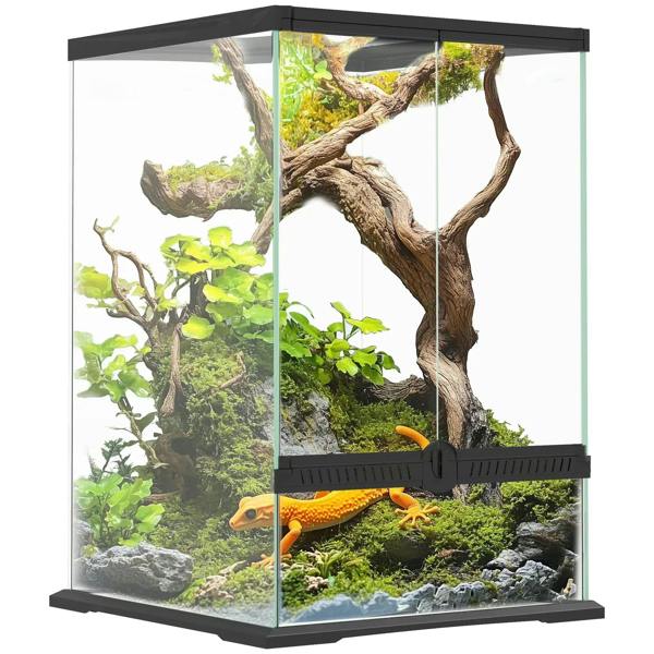 Black-framed glass reptile terrarium with mesh lid and interior basking setup