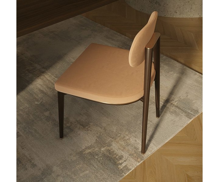 Minimalist Oscar dining chair featuring high-end eucalyptus wood and stylish brass accents.