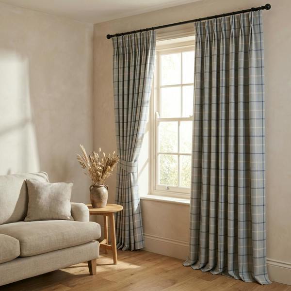 Mull made-to-measure curtains in Ocean, styled in a living room