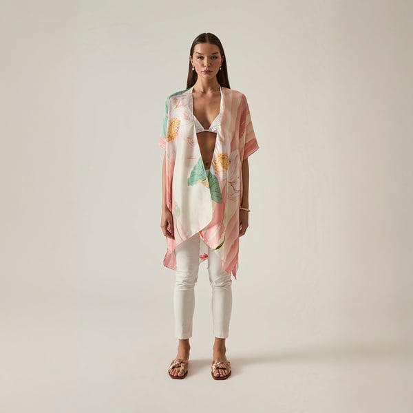 Peach floral print kaftan with white blooms