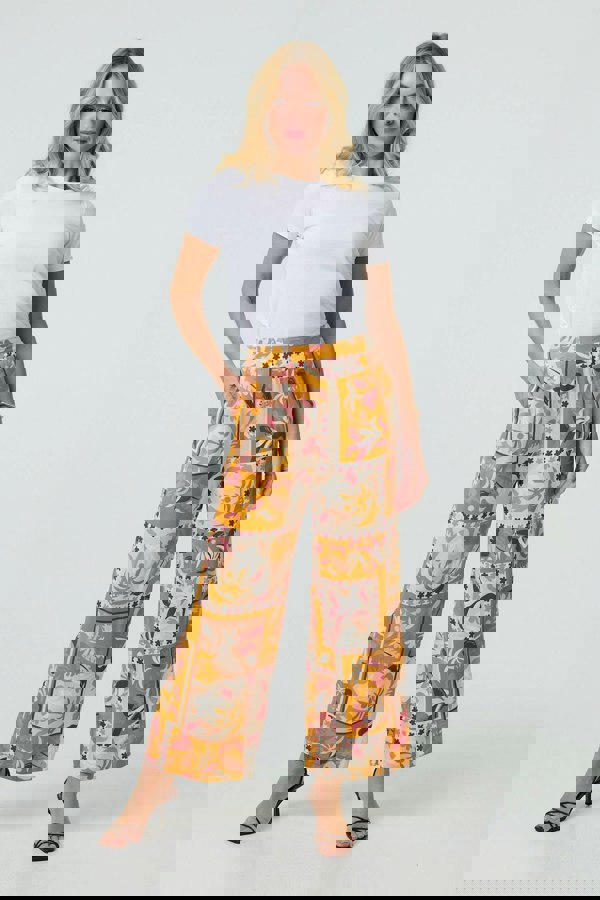 Orange | Patchwork Print High Waist Wide Leg Trousers : Model is 5'10"/178 cm and wears UK8/EU36/US4/AUS8

