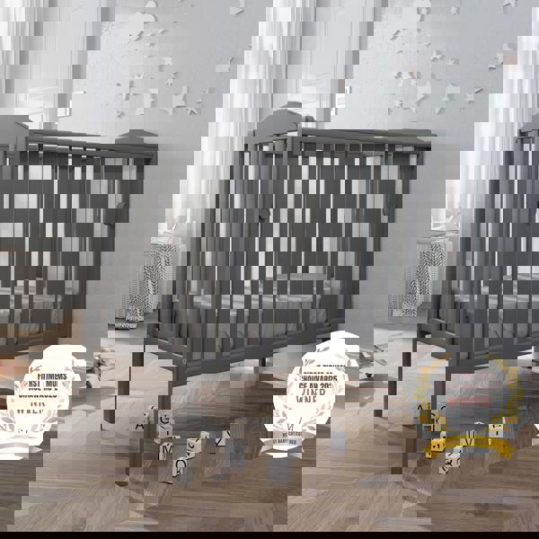 award badge - best baby cot - waffi mini space saver cot with drop side